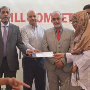 Our Beautician Rabail Thebo Recieving 1st position cash award from DG NAVTTC Raheem Bux Shaikh Sindh in Zonal Competition arranged by NAVTTC